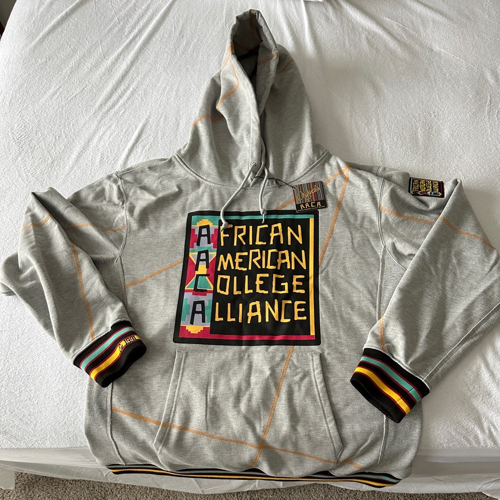 Gray AACA Hoodie with gold stitching